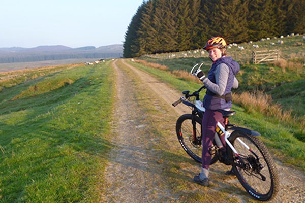 <!-- en-GB-->woman on bike 2<!-- en-GB-->